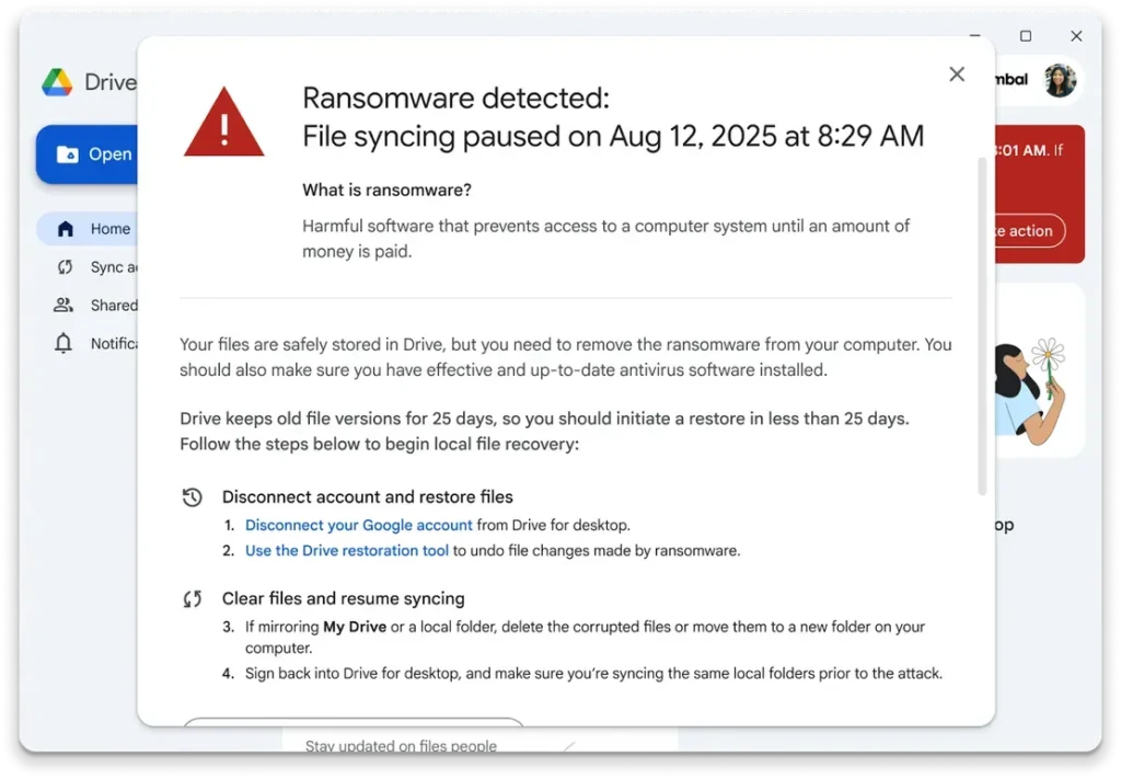 AI Detection and ransomware alert in Google Drive for desktop showing paused file syncing and guided recovery steps.