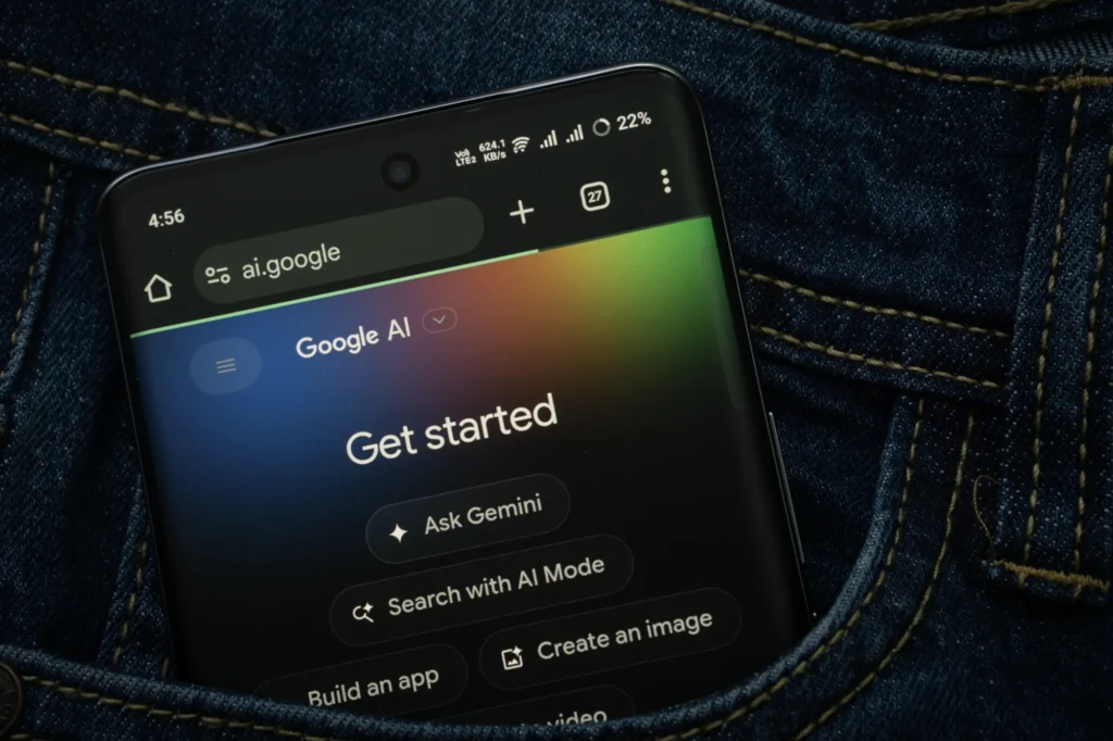 Smartphone showing Google AI and Gemini in a jeans pocket, illustrating how current Gemini models are becoming more visible in everyday mobile use.