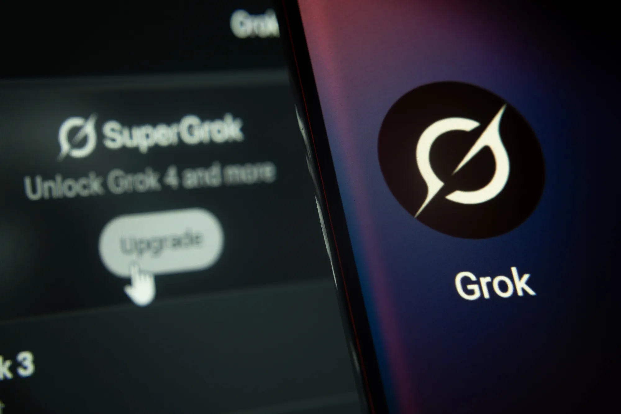 Super Grok upgrade screen displayed on a smartphone next to the Grok app logo