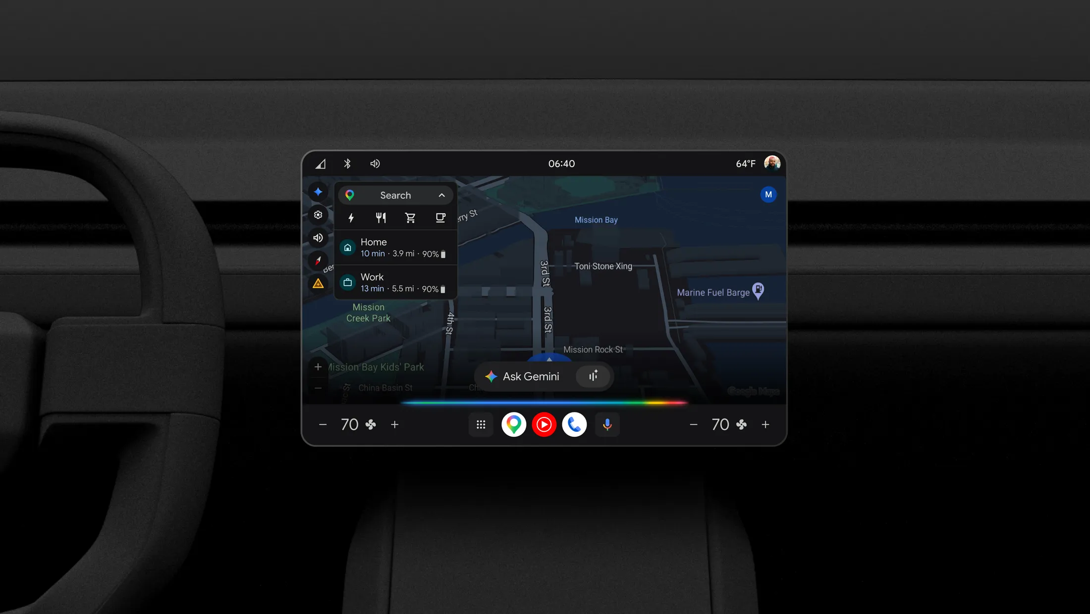 Google built-in dashboard display showing Google Maps with an Ask Gemini button inside a modern car interior.